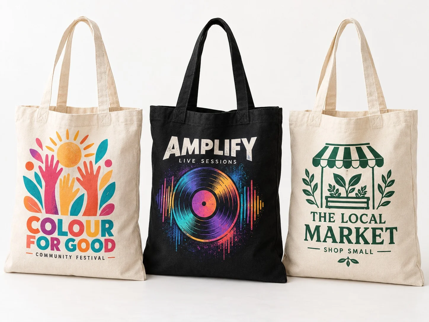 Promotional tote bags with colourful event designs and a single-colour market print.